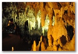Hall of the Formations and Black Lake. The interplay of light and rock formations highlights the cave’s natural beauty.