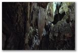 Hall of the Formations and Black Lake, between the first and second waterfalls. The lighting and formations create a captivating landscape.