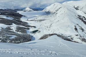 From Piazzale della Brecciara to the summit of Monte Rotondo via the Vergine slope and then the Falco off‑piste